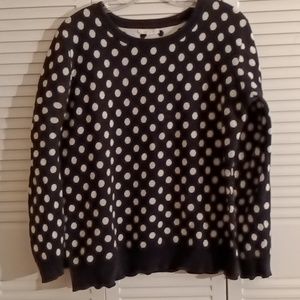 Woman's sweater, black with white polka dots, long sleeve. Size medium